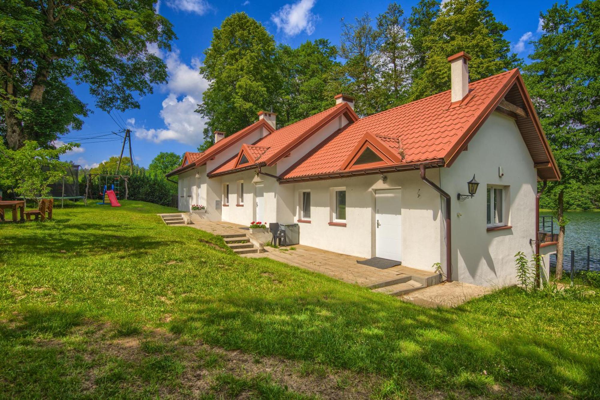 Domki Nad Brzegiem Dluzek ภายนอก รูปภาพ